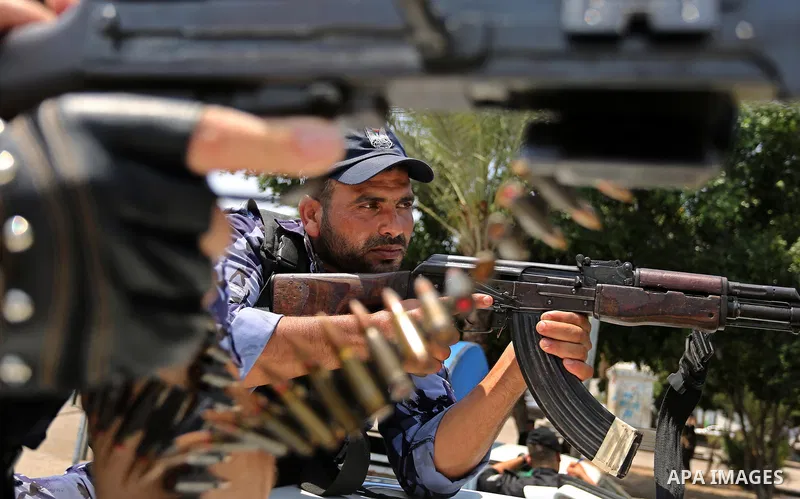 Members of Palestinian forces in Gaza strip take part in a military parade in Gaza City on July 26, 2017 as a tense standoff is underway between Israel and Muslim worshippers at Jerusalem's Al-Aqsa compound. Muslims have...