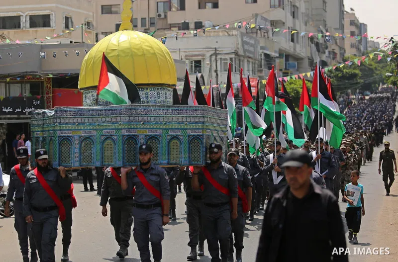 Members of Palestinian forces in Gaza strip carry a model of the Dome of the Rock in a military parade in Gaza City on July 26, 2017 as a tense standoff is underway between Israel and Muslim worshippers at Jerusalem's Al...