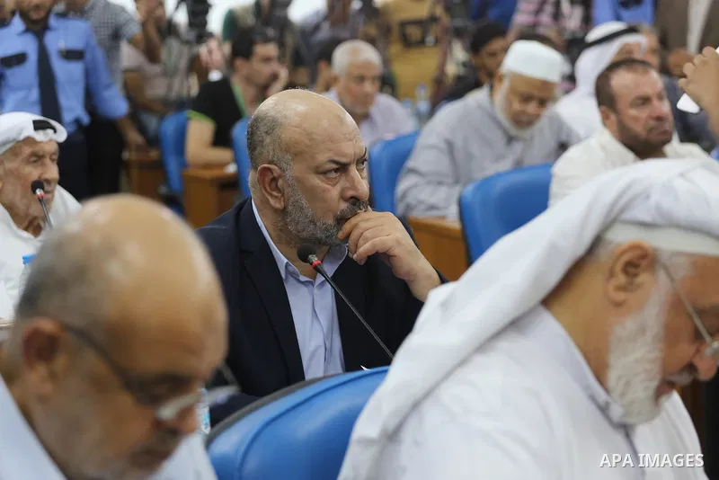 Members of the Palestinian legislative council from Hamas movement attend a meeting at the legislative council, in Gaza city on July 27, 2017. Photo by Mohammed Asad