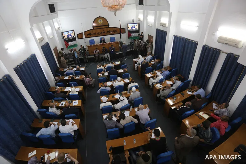 Members of the Palestinian legislative council from Hamas movement attend a meeting at the legislative council, in Gaza city on July 27, 2017. Photo by Mohammed Asad