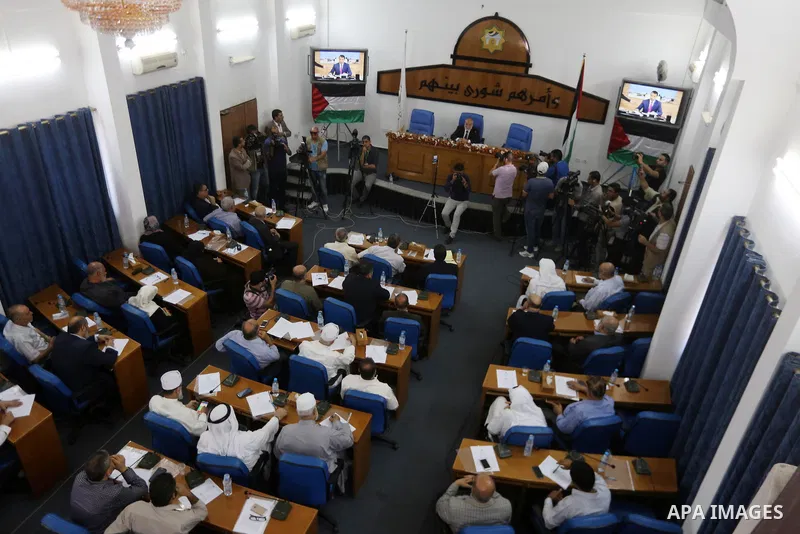 Members of the Palestinian legislative council from Hamas movement attend a meeting at the legislative council, in Gaza city on July 27, 2017. Photo by Mohammed Asad