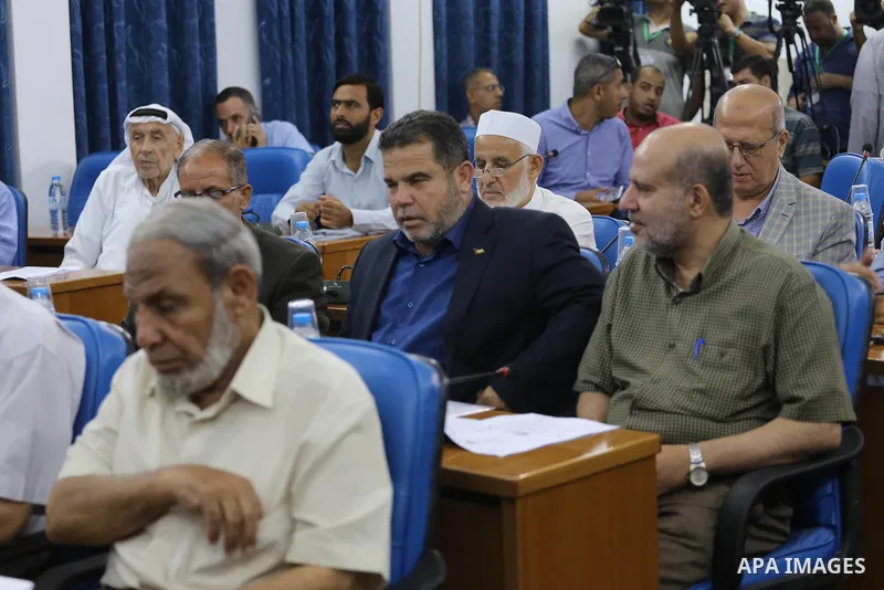 Members of the Palestinian legislative council from Hamas movement attend a meeting at the legislative council, in Gaza city on July 27, 2017. Photo by Mohammed Asad
