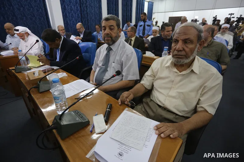 Members of the Palestinian legislative council from Hamas movement attend a meeting at the legislative council, in Gaza city on July 27, 2017. Photo by Mohammed Asad