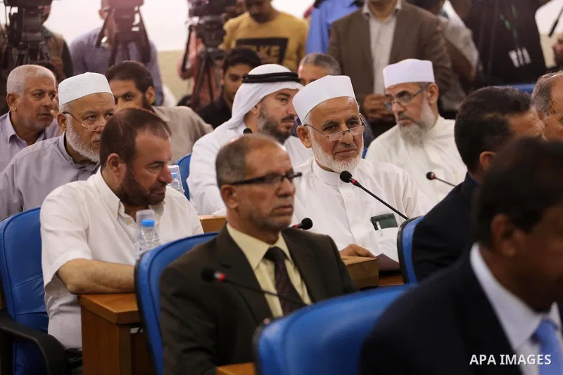 Members of the Palestinian legislative council from Hamas movement attend a meeting at the legislative council, in Gaza city on July 27, 2017. Photo by Mohammed Asad