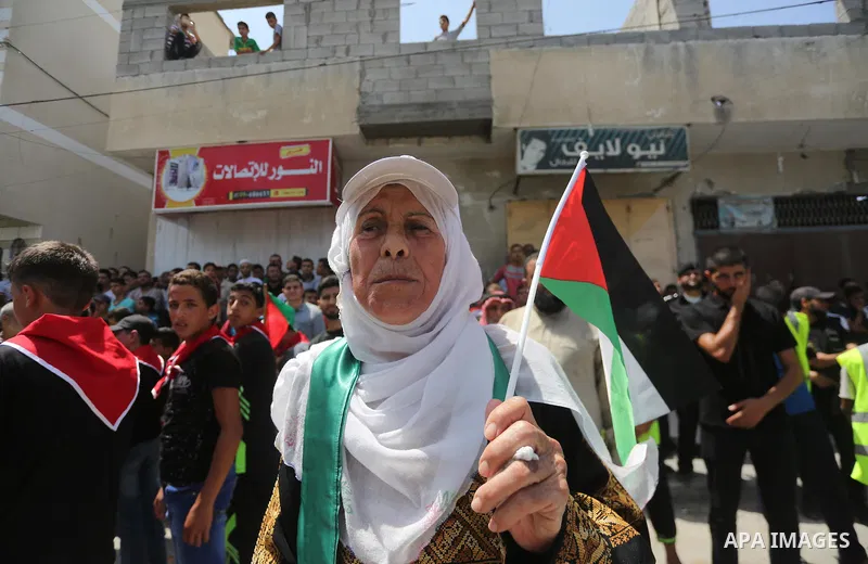 Palestinian supporters of Hamas movement and Islamic Jihad take part in a protest against the recent closure of the Al-Aqsa Mosque compound by Israel, in Jabalia refugee camp in the northern Gaza strip, on July 23, 2017....