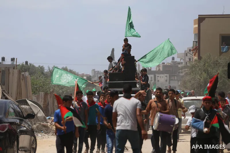 Palestinian supporters of Hamas movement and Islamic Jihad take part in a protest against the recent closure of the Al-Aqsa Mosque compound by Israel, in Jabalia refugee camp in the northern Gaza strip, on July 23, 2017....