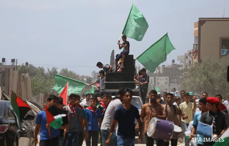 Palestinian supporters of Hamas movement and Islamic Jihad take part in a protest against the recent closure of the Al-Aqsa Mosque compound by Israel, in Jabalia refugee camp in the northern Gaza strip, on July 23, 2017....