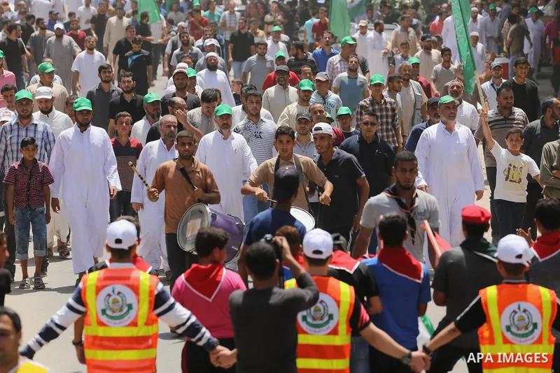 Palestinian supporters of Hamas movement and Islamic Jihad take part in a protest against the recent closure of the Al-Aqsa Mosque compound by Israel, in Jabalia refugee camp in the northern Gaza strip, on July 23, 2017....