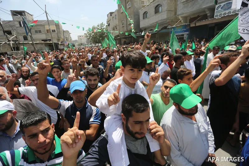 Palestinian supporters of Hamas movement and Islamic Jihad take part in a protest against the recent closure of the Al-Aqsa Mosque compound by Israel, in Jabalia refugee camp in the northern Gaza strip, on July 23, 2017....