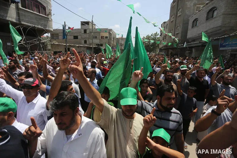 Palestinian supporters of Hamas movement and Islamic Jihad take part in a protest against the recent closure of the Al-Aqsa Mosque compound by Israel, in Jabalia refugee camp in the northern Gaza strip, on July 23, 2017....