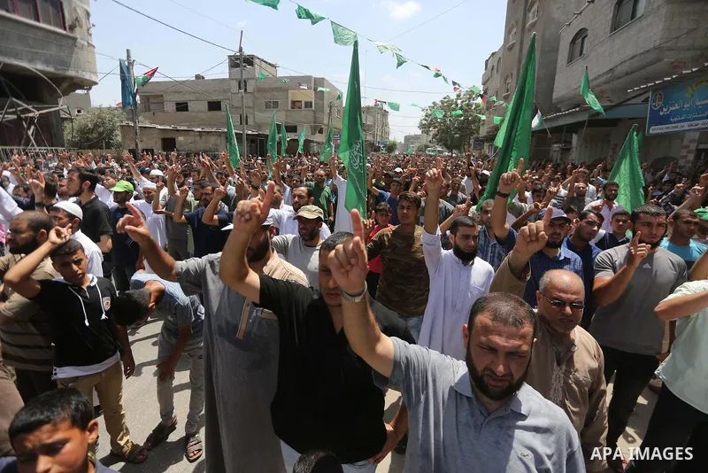 Palestinian supporters of Hamas movement and Islamic Jihad take part in a protest against the recent closure of the Al-Aqsa Mosque compound by Israel, in Jabalia refugee camp in the northern Gaza strip, on July 23, 2017....