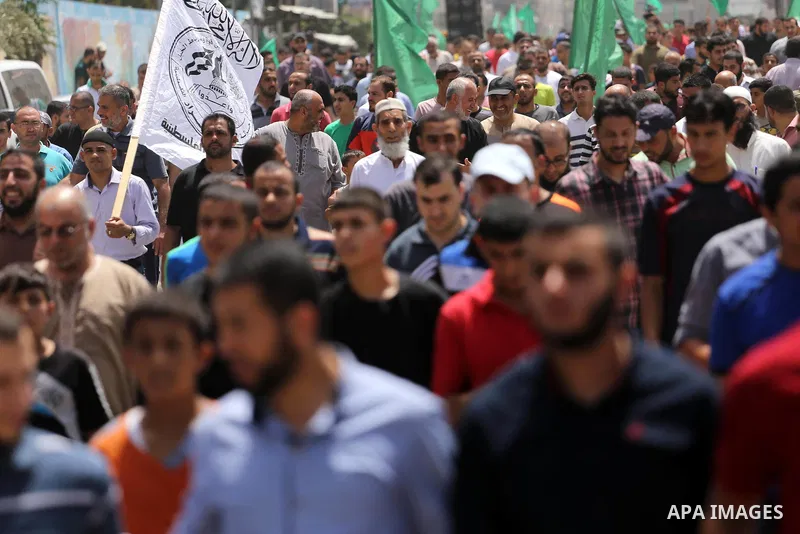 Palestinian supporters of Hamas movement and Islamic Jihad take part in a protest against the recent closure of the Al-Aqsa Mosque compound by Israel, in Jabalia refugee camp in the northern Gaza strip, on July 23, 2017....