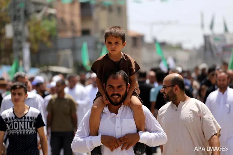Palestinian supporters of Hamas movement and Islamic Jihad take part in a protest against the recent closure of the Al-Aqsa Mosque compound by Israel, in Jabalia refugee camp in the northern Gaza strip, on July 23, 2017....