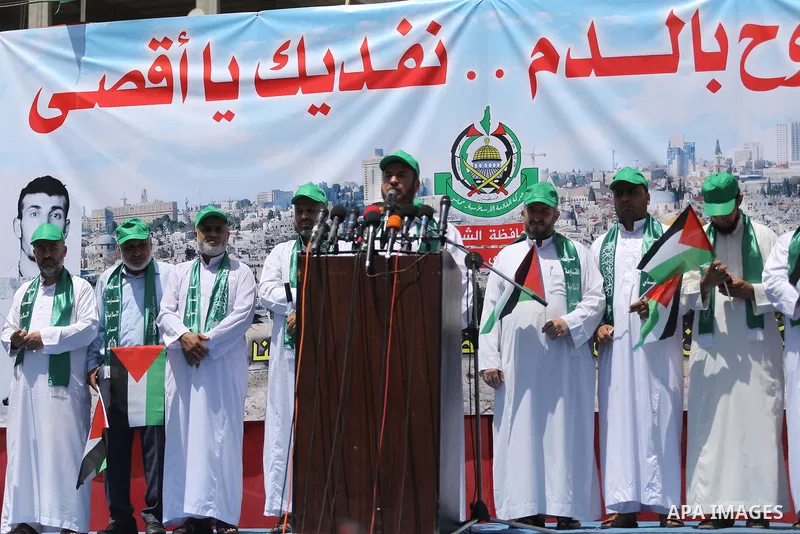 Senior Hamas leader Fathi Hammad speaks during a protest against the recent closure of the Al-Aqsa Mosque compound by Israel, in Jabalia refugee camp in the northern Gaza strip, on July 23, 2017. Photo by Mohammed Asad