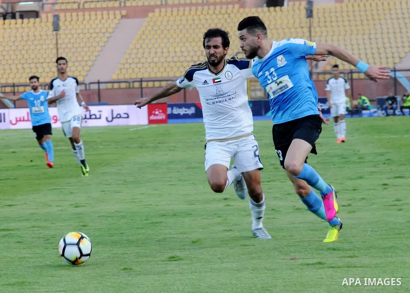 Jordan's Al-Faisaly players compete with UAE's Al-Wahda players during Arab Club championship at Al-Salam Stadium in Cairo, Egypt on July 28, 2017. Photo by Amr Sayed