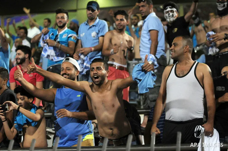 Jordan's Al-Faisaly fans react during the match between Al-Faisaly club and UAE's Al-Wahda clup at Arab Club championship at Al-Salam Stadium in Cairo, Egypt on July 28, 2017. Photo by Amr Sayed