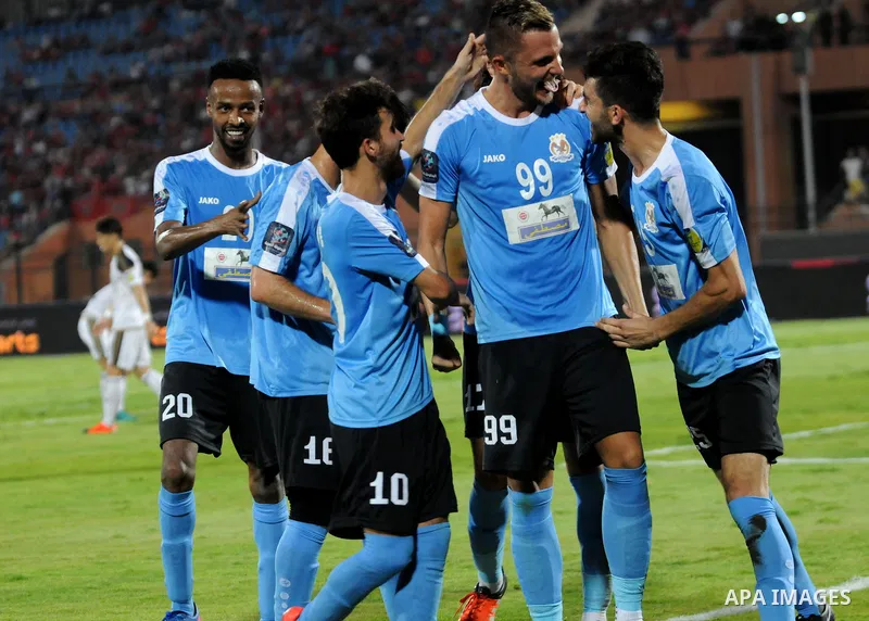 Jordan's Al-Faisaly players compete with UAE's Al-Wahda players during Arab Club championship at Al-Salam Stadium in Cairo, Egypt on July 28, 2017. Photo by Amr Sayed