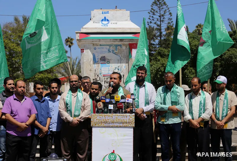 Palestinian supporters of Hamas movement take part during a rally to celebrate marking Israel's removal of all security measures it had installed that were implemented at the Al-Aqsa mosque compound in Jerusalem, in Gaza...