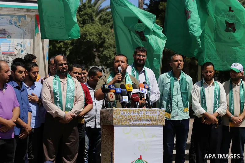Palestinian supporters of Hamas movement take part during a rally to celebrate marking Israel's removal of all security measures it had installed that were implemented at the Al-Aqsa mosque compound in Jerusalem, in Gaza...
