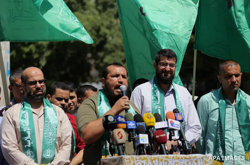 Palestinian supporters of Hamas movement take part during a rally to celebrate marking Israel's removal of all security measures it had installed that were implemented at the Al-Aqsa mosque compound in Jerusalem, in Gaza...