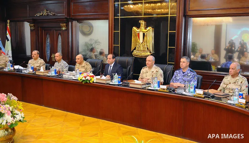 Egyptian President Abdel Fattah al-Sisi chairs a meeting of the supreme council of the armed forces, in Cairo, Egypt, on July 29, 2017. Photo by Egyptian President Office