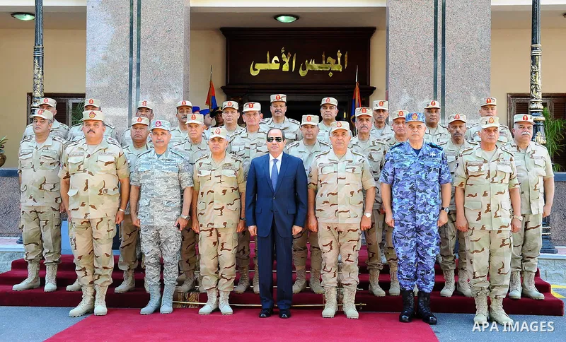 Egyptian President Abdel Fattah al-Sisi chairs a meeting of the supreme council of the armed forces, in Cairo, Egypt, on July 29, 2017. Photo by Egyptian President Office
