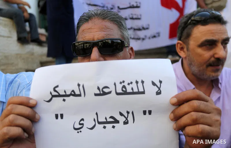 Palestinians, employed by the Palestinian Authority take part in a protest demanding their salaries in Gaza city on August 1, 2017. Photo by Mohammed Asad
