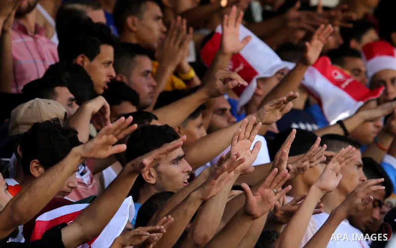 Fans of Shabab Rafah football club celebrate their team's victory against Hebron's Ahly al-Khalil football club in the first leg of the Palestine Cup final at the Yarmouk Stadium in Gaza City on August 1, 2017. Photo by...