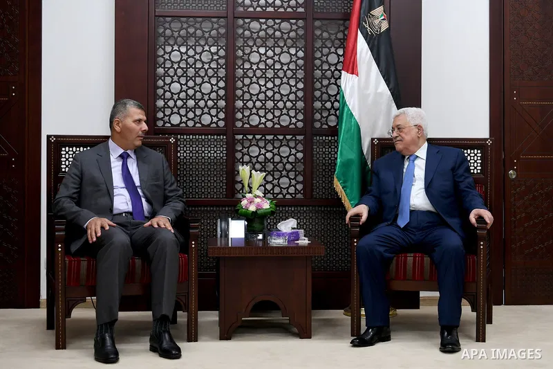 Palestinian President Mahmoud Abbas meets with a delegation from Hamas movement, at his headquarter in the West Bank city of Ramallah on August 01, 2017. Photo by Osama Falah