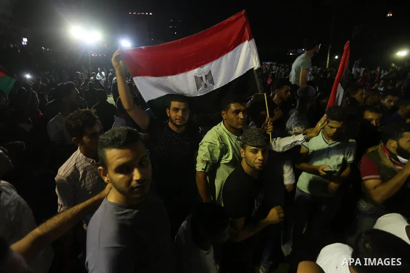 Palestinian demonstrators take part in protest to show their solidarity with Egyptian people, in Gaza City, on August 5, 2017. Photo by Mohammed Asad