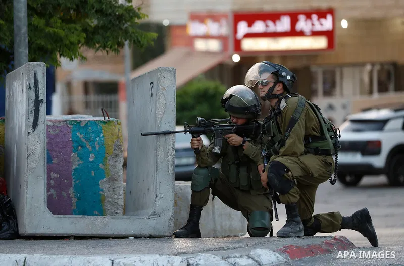 Palestinian protesters clash with Israeli security forces in the West Bank town of Bethlehem on July 19, 2017, following a demonstration against new Israeli security measures at the Al-Aqsa mosque compound in Jerusalem t...