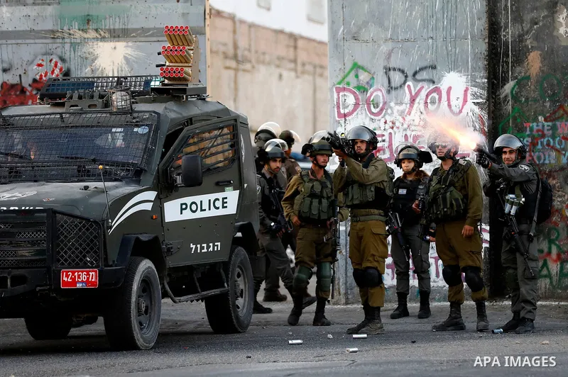 Palestinian protesters clash with Israeli security forces in the West Bank town of Bethlehem on July 19, 2017, following a demonstration against new Israeli security measures at the Al-Aqsa mosque compound in Jerusalem t...