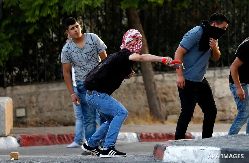 Palestinian protesters clash with Israeli security forces in the West Bank town of Bethlehem on July 19, 2017, following a demonstration against new Israeli security measures at the Al-Aqsa mosque compound in Jerusalem t...