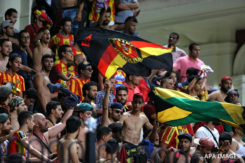 Jordan's Al-Faisaly supporters react during the Arab Club championship final match in Alexandria Stadium on August 6, 2017. Photo by Stringer