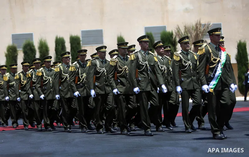 Jordan's King Abdullah II and Palestinian president Mahmud Abbas observes the honor guard during a visit in the West Bank city of Ramallah on August 7, 2017. Jordan's King began a rare visit to the occupied West Bank to...