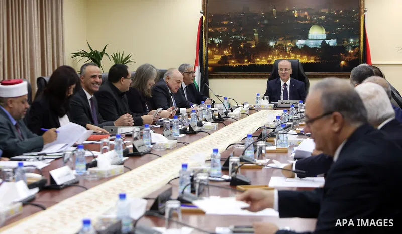 Palestinian Prime Minister, Rami hamdallah, chairs the Palestinian council meeting in the West Bank city of Ramallah on August 8, 2017. Photo by Prime Minister Office