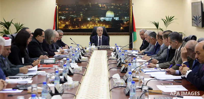 Palestinian Prime Minister, Rami hamdallah, chairs the Palestinian council meeting in the West Bank city of Ramallah on August 8, 2017. Photo by Prime Minister Office