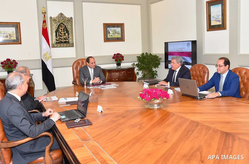 Egyptian President Abdel Fattah al-Sisi meets with Prime Minister Sharif Ismail in Cairo, Egypt on August 8, 2017. Photo by Egyptian President Office