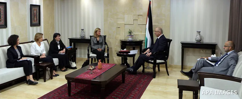 Palestinian Prime Minister, Rami Hamdallah, meets with UNICEF representative in Palestine, Genevieve Putin, in the West Bank city of Ramallah, on August 9, 2017. Photo by Prime Minister Office