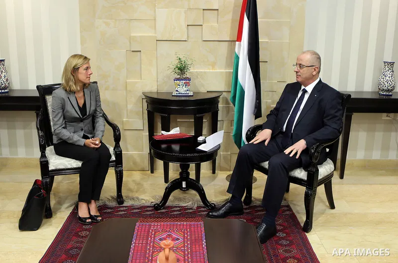 Palestinian Prime Minister, Rami Hamdallah, meets with UNICEF representative in Palestine, Genevieve Putin, in the West Bank city of Ramallah, on August 9, 2017. Photo by Prime Minister Office