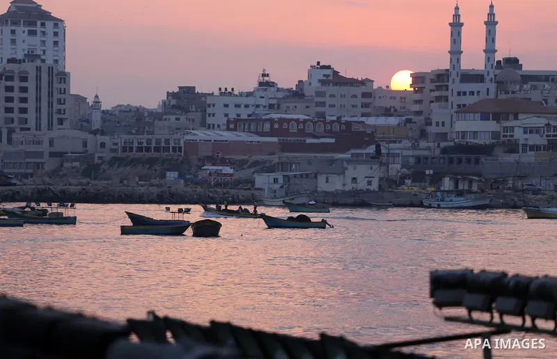 A picture taken at Sunrise on August 10, 2017 shows the Gaza seaport. Photo by Mohammed Asad