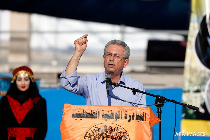 Palestinian legislator Mustafa Barghouti speaks during the Festival of the movement of Palestinian National Initiative in West Bank city of Bethlehem on August 11, 2017. Photo by Wisam Hashlamoun