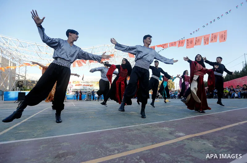 Palestinian youth perform traditional Palestinian dance during the Festival of the movement of Palestinian National Initiative Mustafa Barghouti in West Bank city of Bethlehem on August 12, 2017. Photo by Wisam Hashlamou...