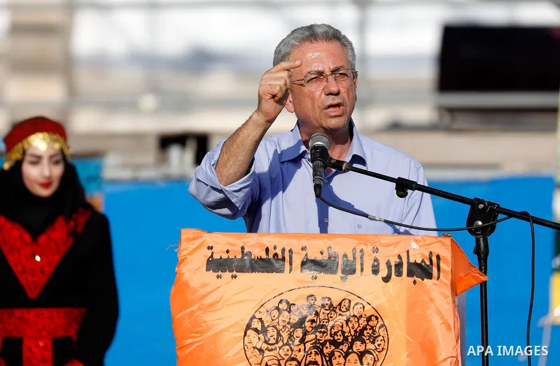 Palestinian legislator Mustafa Barghouti speaks during the Festival of the movement of Palestinian National Initiative in West Bank city of Bethlehem on August 11, 2017. Photo by Wisam Hashlamoun