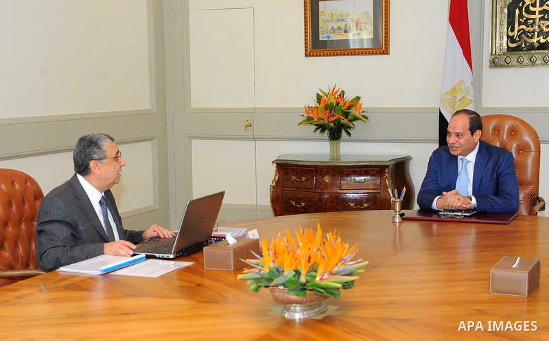 Egyptian President Abdel Fattah al-Sisi meets with Minister of Electricity and Renewable Energy in Cairo, Egypt on August 13, 2017. Photo by Egyptian President Office