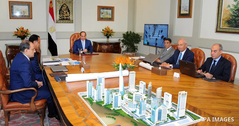 Egyptian President Abdel Fattah al-Sisi meets with Minister of Housing in Cairo, Egypt on August 13, 2017. Photo by Egyptian President Office