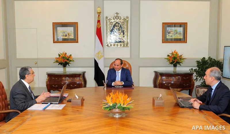 Egyptian President Abdel Fattah al-Sisi meets with Minister of Electricity and Renewable Energy in Cairo, Egypt on August 13, 2017. Photo by Egyptian President Office