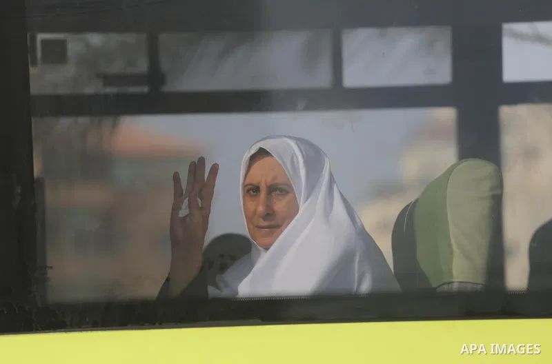 Palestinian Muslim pilgrims wave towards their relatives before leaving for the annual haj pilgrimage to the holy city of Mecca, in Gaza city on August 14, 2017. Photo by Mohammed Asad