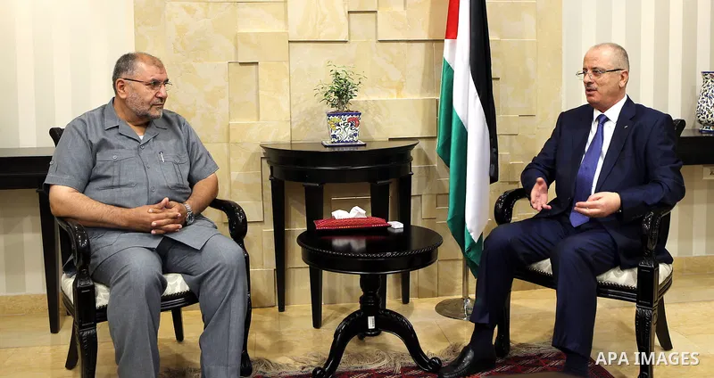 Palestinian Prime Minister, Rami Hamdallah, meets with Deputies of the Legislative Council, in the West Bank city of Ramallah, on August 14, 2017. Photo by Prime Minister Office