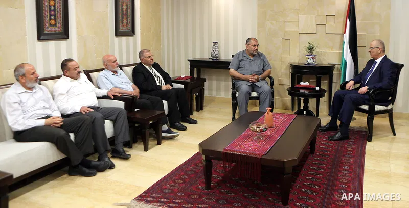 Palestinian Prime Minister, Rami Hamdallah, meets with Deputies of the Legislative Council, in the West Bank city of Ramallah, on August 14, 2017. Photo by Prime Minister Office